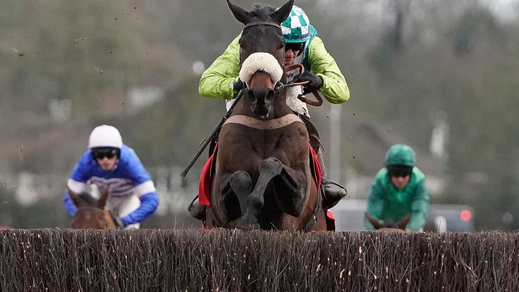 Sam Twiston-Davies riding Clan Des Obeaux clear the last to win the Ladbrokes King George VI Chase at Kempton on Thursday. Photograph: Alan Crowhurst/Getty Images