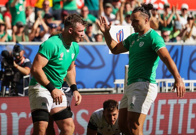 Ireland’s Peter O’Mahony is congratulated by James Lowe after scoring a try against Romania. Photograph: Laszlo Geczo/Inpho