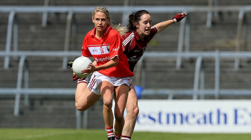 Cork’s Orla Finn goes past Lisa Gannon. Photograph: Donall Farmer/Inpho