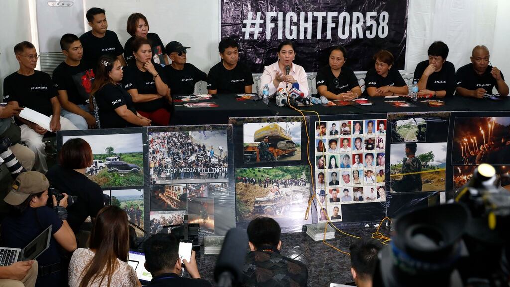 Relatives of victims accompanied by a private prosecutor hold a press conference after the promulgation of the Maguindanao Massacre case in Taguig City, Philippines. Photograph: Rolex Dela Pena/EPA