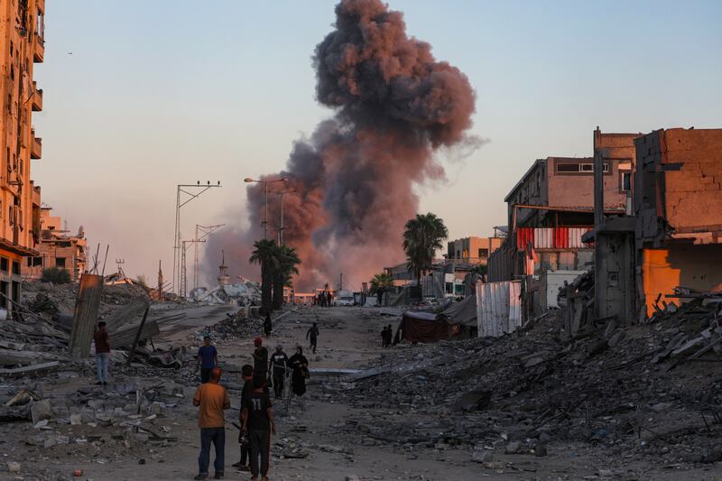 Smoke rises near the Islamic University following Israeli air strikes on Gaza City on Tuesday. Photograph: Mohammed Saber/EPA