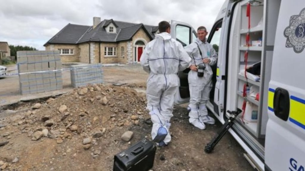 Gardaí and crime scene investigators at the scene of a fatal shooting at Botherboy Saggart, Co Dublin. Andy Connors was shot dead in his home on August 19th, 2014. Photograph: Colin Keegan/Collins Dublin.