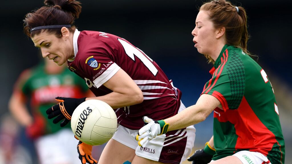 Westmeath’s Laura Walsh & Sarah Tierney of Mayo during the TG4 Ladies Senior All-Ireland Football Championship Quarter-Final. Photo: Tom Beary/Inpho