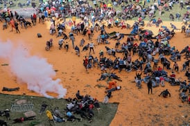 Four killed after Kenyan forces fire shots and teargas to disperse Odinga mourners