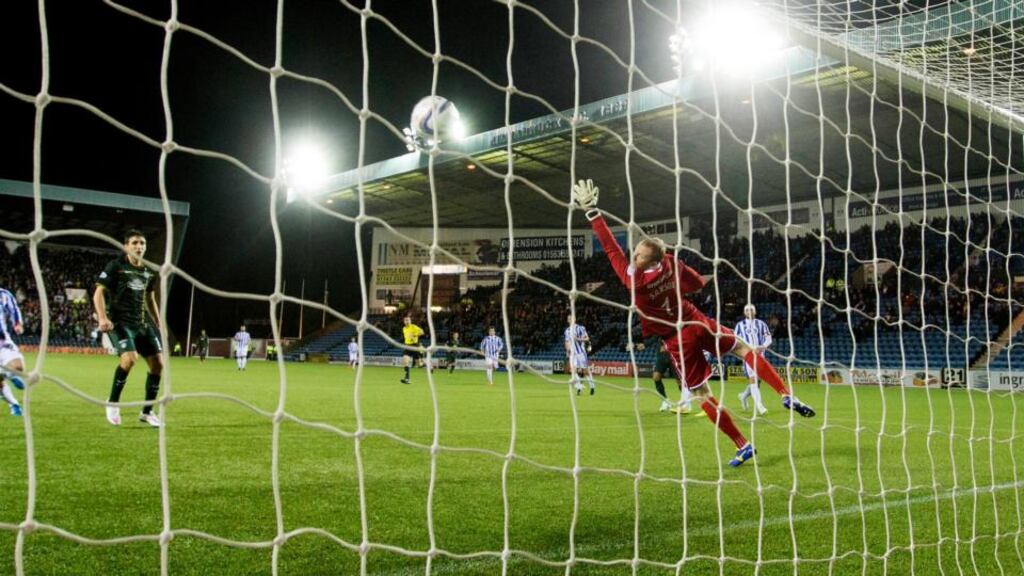 Celtic’s Emilio Izaguirre opens the scoring in the Scottish Premierships match against Kilmarnock at Rugby Park. Photograph: Jeff Holmes/PA