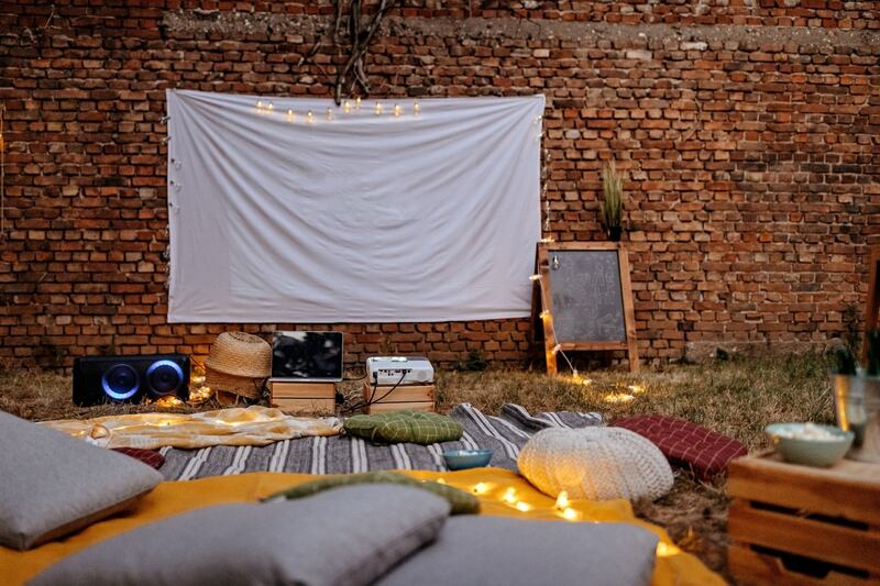 When it comes to setting up a screen, you could go old-school and peg a sheet to a clothesline. Photograph: iStock