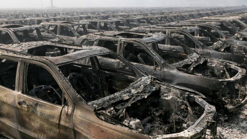 Hundreds of destroyed cars that had been brand new at the site of the massive explosions in Tianjin on August 13th, 2015. Photograph: AFP/Getty Images