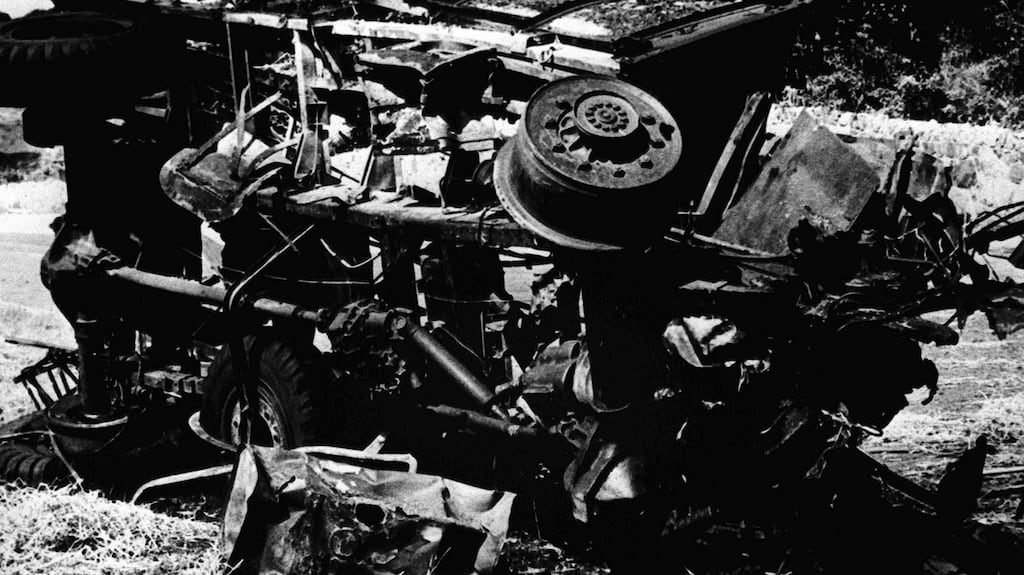 Handout file photo from August 28th, 1979 of the remains of a British army truck destroyed in the IRA bombing in Warrenpoint, Co Down. Photograph: PA