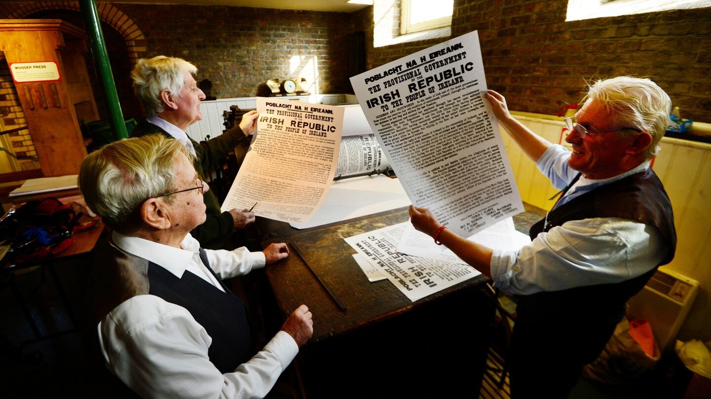 Printers Alf McCormack, Billy Ryan and Freddie Snowe checking the special limited edition print run of 100 copies of the Proclamation, to commemorate the 100th anniversary of the rising at the National Print Museum. The Proclamation was printed on mould paper using a 160-year-old Wharfdale printing press similar to the one used in Liberty Hall in 1916. Photograph: Cyril Byrne