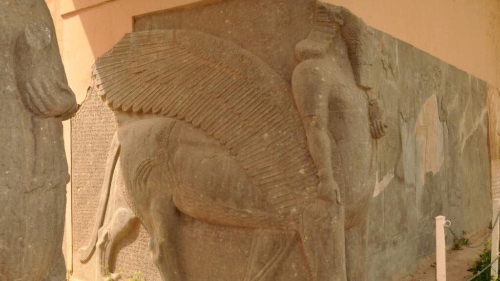 An April 2013 photograph shows an ancient statue of a winged bull with a human face at the archaeological site of Nimrud. Photograph: Getty Images
