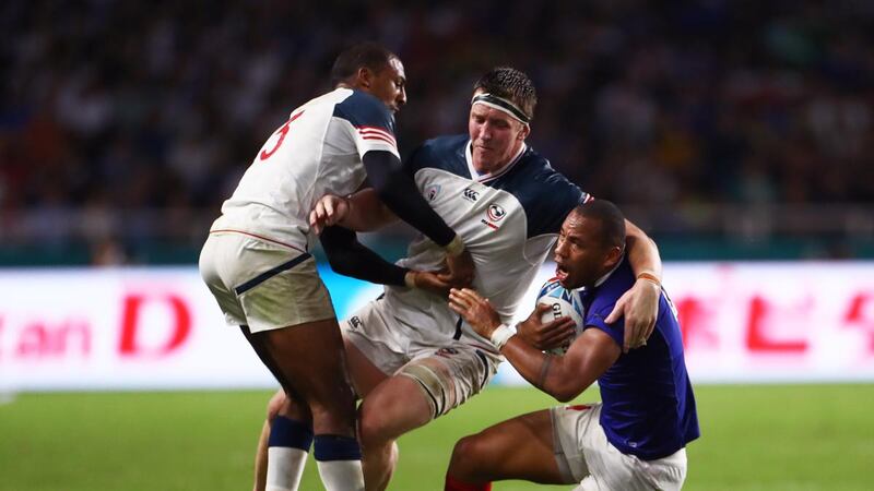 Gael Fickou of France is tackled by Paul Mullen of the United States during the Rugby World Cup Group C game between France and USA at Fukuoka Stadium in Japan on October 2nd. Photograph: Francois Nel/World Rugby via Getty Images