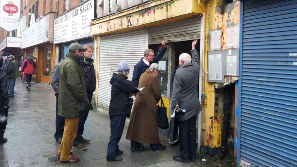 Members of the Save Moore Street campaign enter Number 16 Moore Street where the last headquarters of the Provisional Government was based during the 1916 Easter Rising. Photograph: Éanna Ó Caollaí/The Irish Times