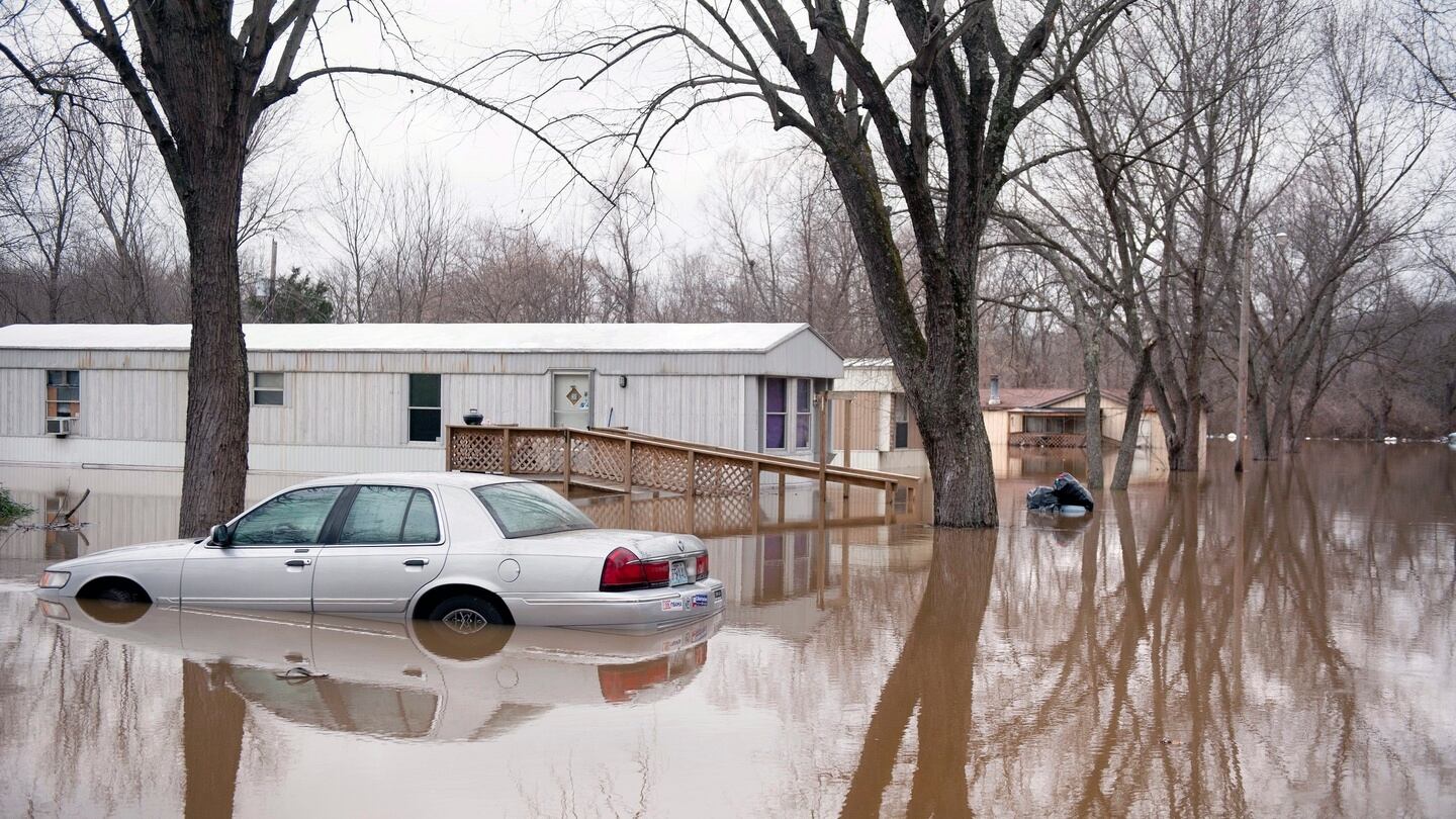 Flood waters from the Big River submerge cars and mobile homes in the Riverbend Mobile Home Park near High Ridge, Missouri. Historic rainfall across the American Midwest have pushed the Meramec and Big rivers in Missouri, tributaries to the Mississippi River, to record levels. Photograph: EPA
