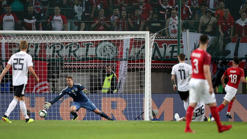 Austria’s Alessandro Schopf scores their second goal in a pre-World Cup friendly against Germany. Photo: Lisi Niesner/Reuters