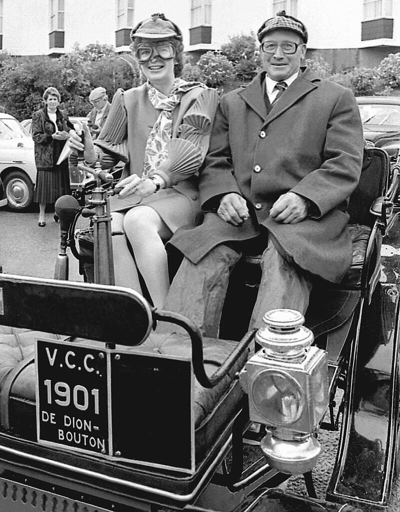 'Setting off on the long journey to The Park. I took this photograph of Mary Robinson in early July 1990 when she launched the Connacht Veteran and Vintage Motor Club Rally in Ballina. She is pictured with Ossie Bennett in his 1901 De Dion-Bouton, which was the oldest rally car in the country.' Photograph: Henry Wills