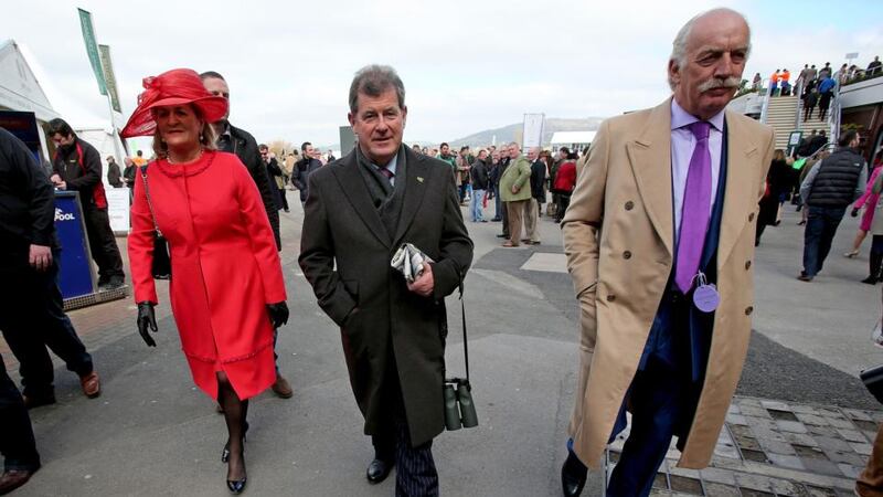 Noreen McManus, JP McManus and Dermot Desmond arrive at the track. Photograph: Dan Sheridan