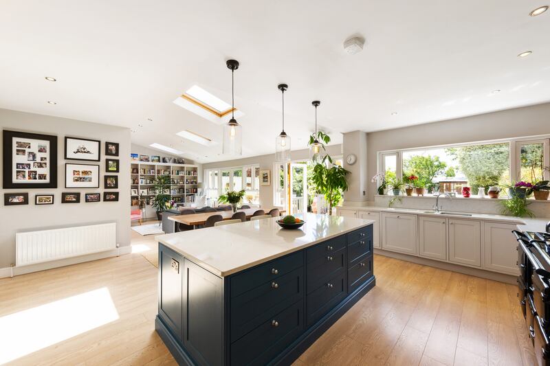 The house features a large open plan kitchen and living area.