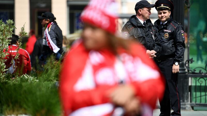 Police officers stand guard in the streets of Yekaterinburg before the match between France and Peru. Photograph: Getty Images