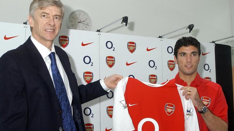 Jose Antonio Reyes with Arsene Wenger after signing for Arsenal. Photograph: John Stillwell/PA