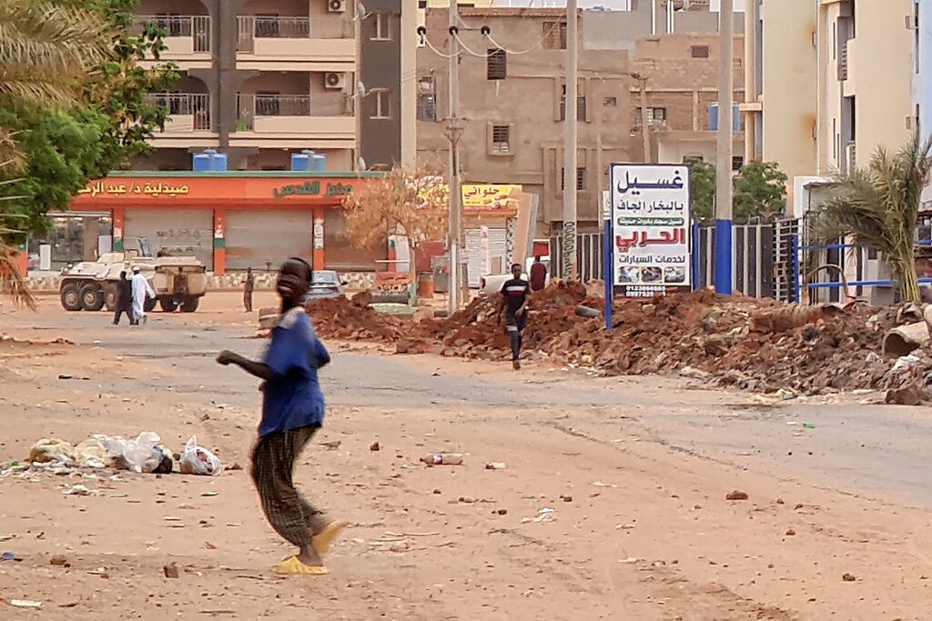 A Sudanese army armoured personnel carrier is parked near a trench in Khartoum as fighting continues between Sudan's army and the paramilitary forces. The Sudanese army pounded paramilitaries in the capital with air strikes on April 27th, while deadly fighting flared in Darfur. Photograph: AFP via Getty Images