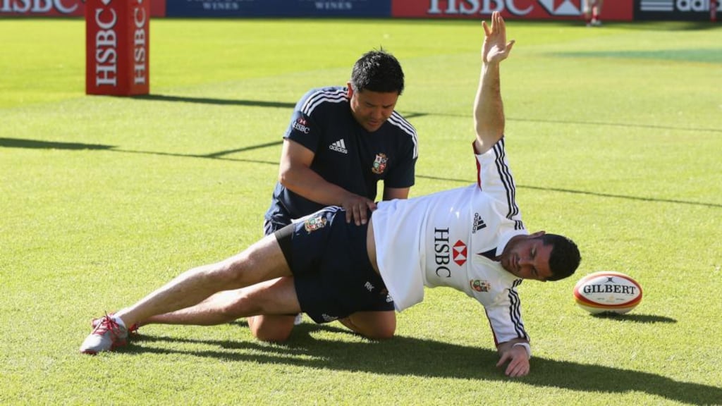 Rob Kearney receives treatment from Lions physiotherapist Prav Mathema during the British and Irish Lions captain’s run at NIB Stadium. Photograph: David Rogers/Getty Images
