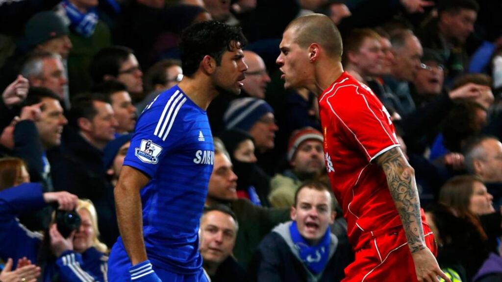 Chelsea’s Diego Costa and Liverpool’s Martin Skrtel exchange pleasantries on Tuesday. Photograph: Eddie Keogh/Reuters