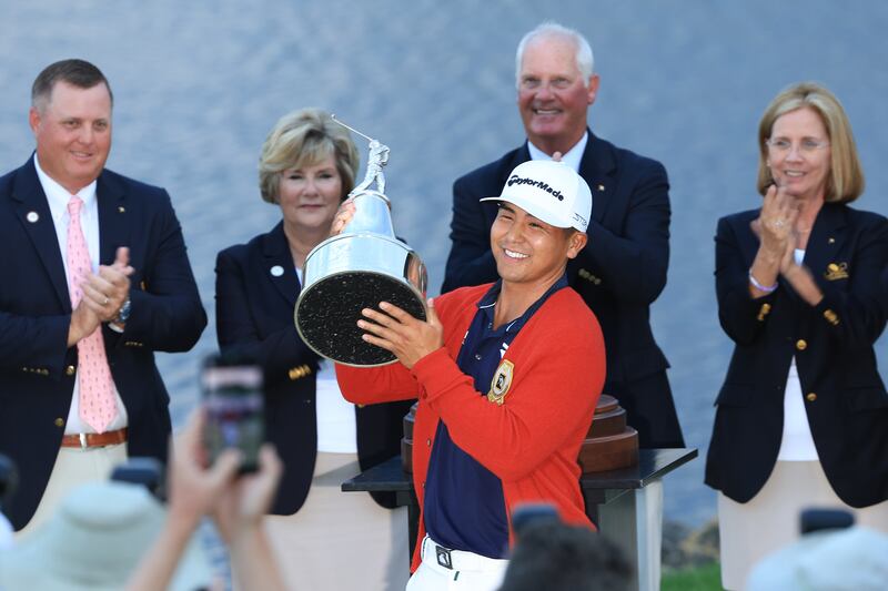 Kurt Kitayama celebrates with the trophy after winning the Arnold Palmer Invitational at Bay Hill last year. Photograph: Sam Greenwood/Getty Images