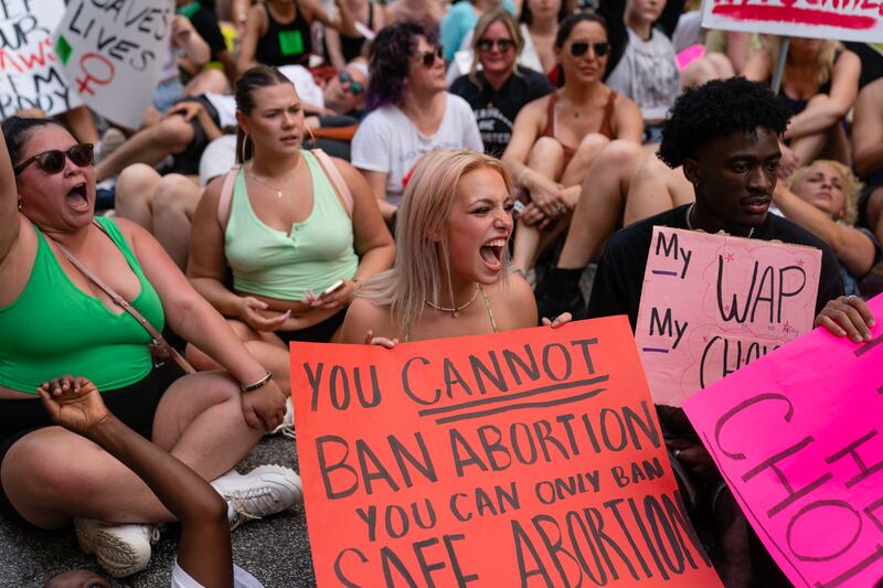 People protest outside the US court of appeals for the eleventh circuit in Atlanta, Georgia. Photograph: Elijah Nouvelage/Getty Images