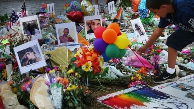 People visit a memorial down the road from the Pulse nightclub in Orlando, Florida. File photograph: Spencer Platt/Getty Images