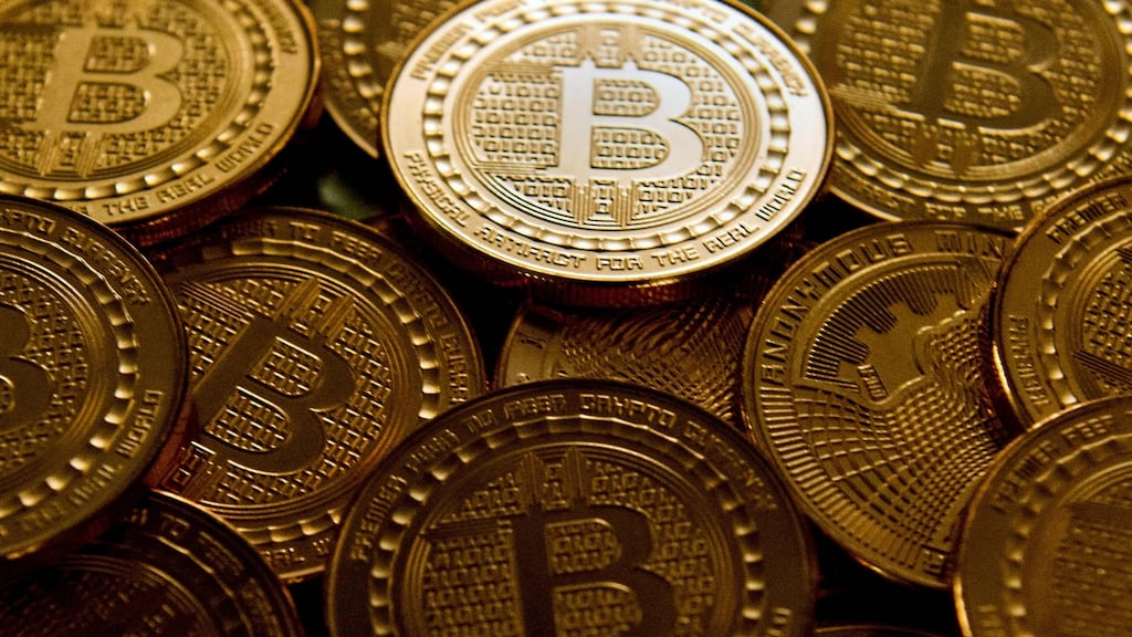 Irish investors are turning to crypto currencies such as Bitcoin in growing numbers to try and benefit from outsize gains. Photograph: Karen BLEIER/AFP/Getty Images