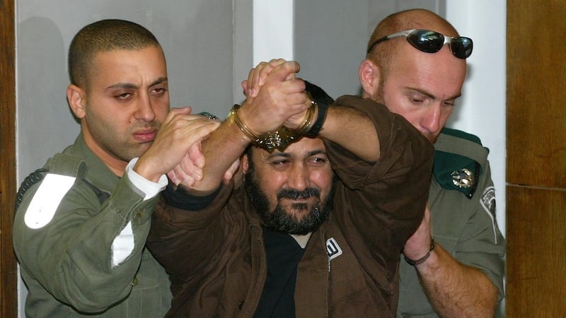 Marwan Barghouti being ushered into court in 2003 in Tel Aviv, Israel. Photograph: David Silverman/Getty Images
