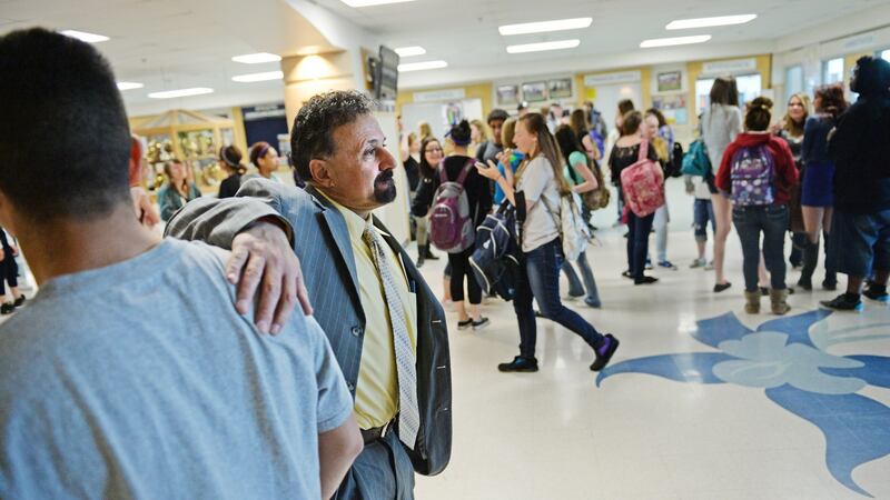 Picking up the pieces: Frank DeAngelis at Columbine High School. Photograph: RJ Sangosti/Denver Post via Getty