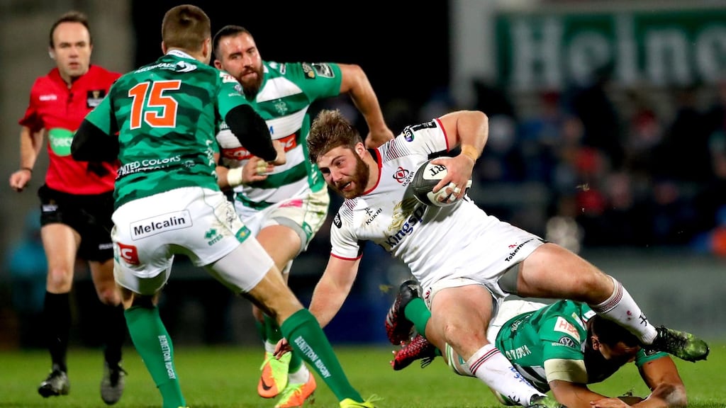 Ulster’s John Andrew is tackled by Nasi Manu of Benetton Rugby during their Pro14 clash. Photo: James Crombie/Inpho