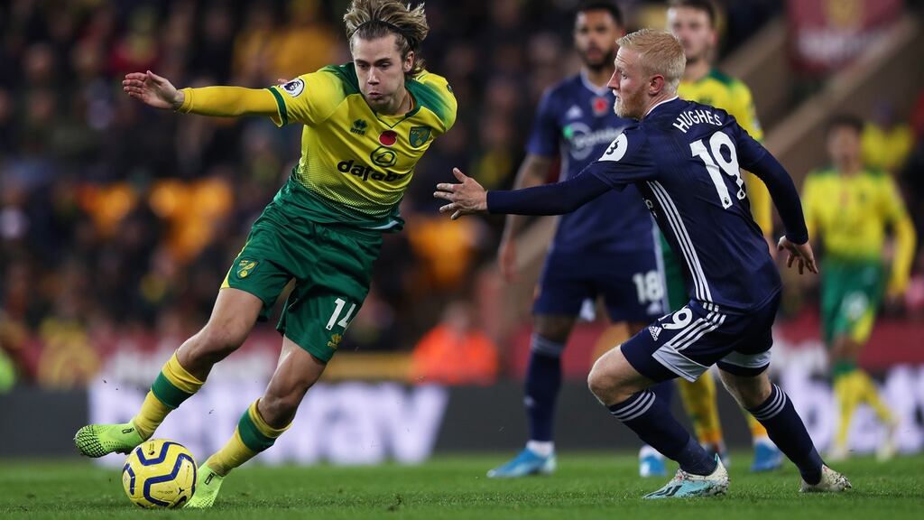 Tom Trybull of Norwich in action against Will Hughes of Watford during the Premier League match at Carrow Road. Photograph: Naomi Baker/Getty Images
