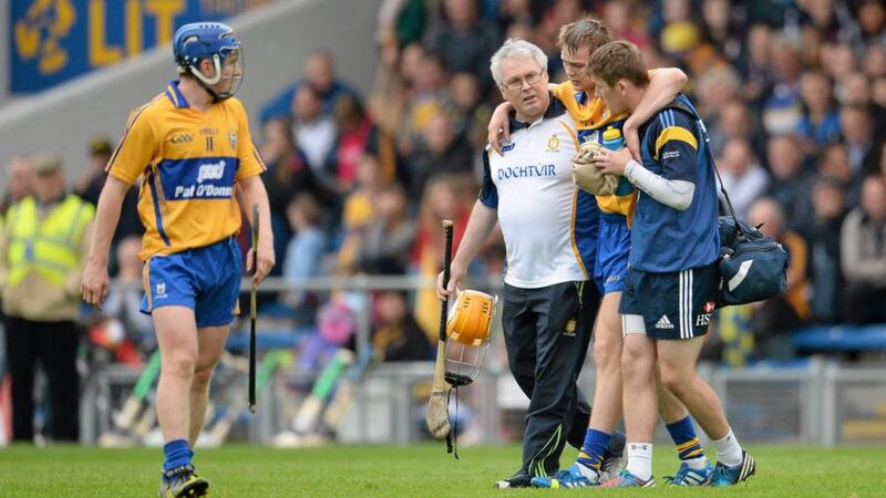 Clare’s Aaron Cunningham is helpedfrom the field after sustaining a  hamstring injury in their win over Galway at Semple Stadium. Photograph: Stephen McCarthy/Sportsfile