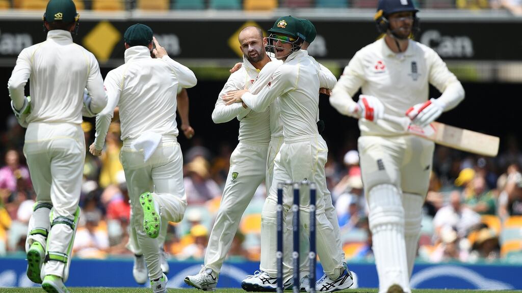 Nathan Lyon celebrates the early dismissal of Mark Stoneman in Brisbane. Photograph: Dave Hunt/EPA