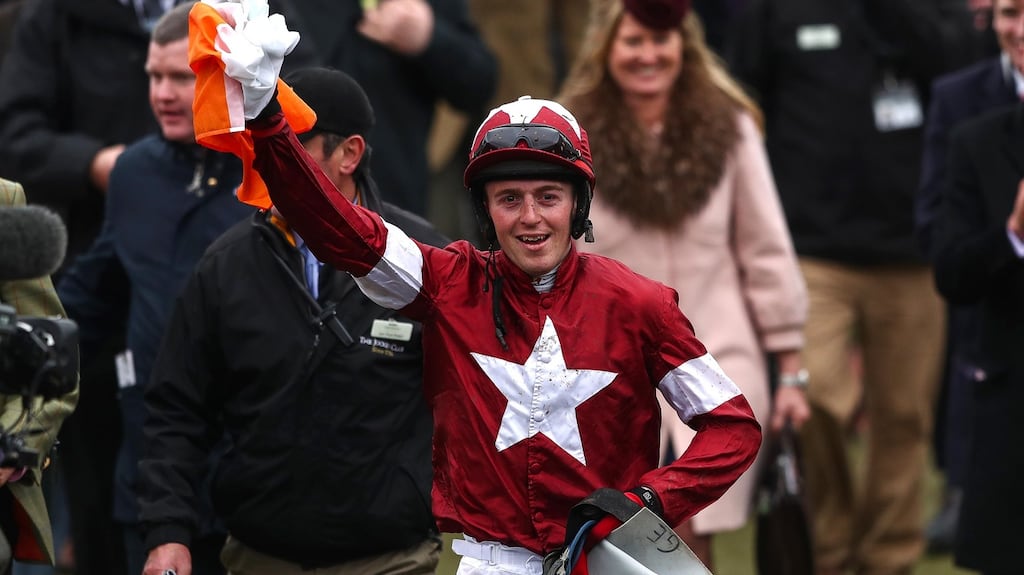 Keith Donoghue celebrates winning the Glenfarclas Chase at Cheltenham on Tiger Roll. Photograph: James Crombie/Inpho