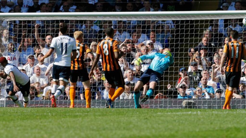 Danny Rose (far left) scores Tottenham’s second goal in the Premier League game against Hull at White Hart Lane. Photo: Suzanne Plunkett/ Reuters/Livepic