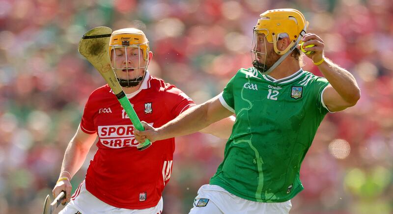 Cork’s Shane Barrett and Limerick's Tom Morrissey. Photograph: James Crombie/Inpho