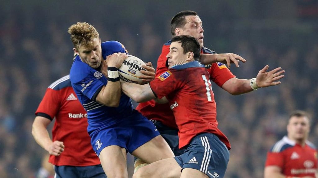 Leinster’s Ian Madigan clashes with Felix Jones and James Coughlan of Munster during the Pro 12 match at the  Aviva Stadium last March. Photograph: Inpho
