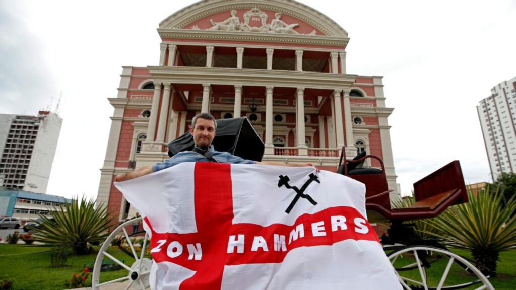 English soccer fan Jimmy Barwick outside the Teatro Amazonas opera house in Manaus, Brazil, birthplace of Milton Hatoum. Photograph: Rungroj Yongrit/EPA