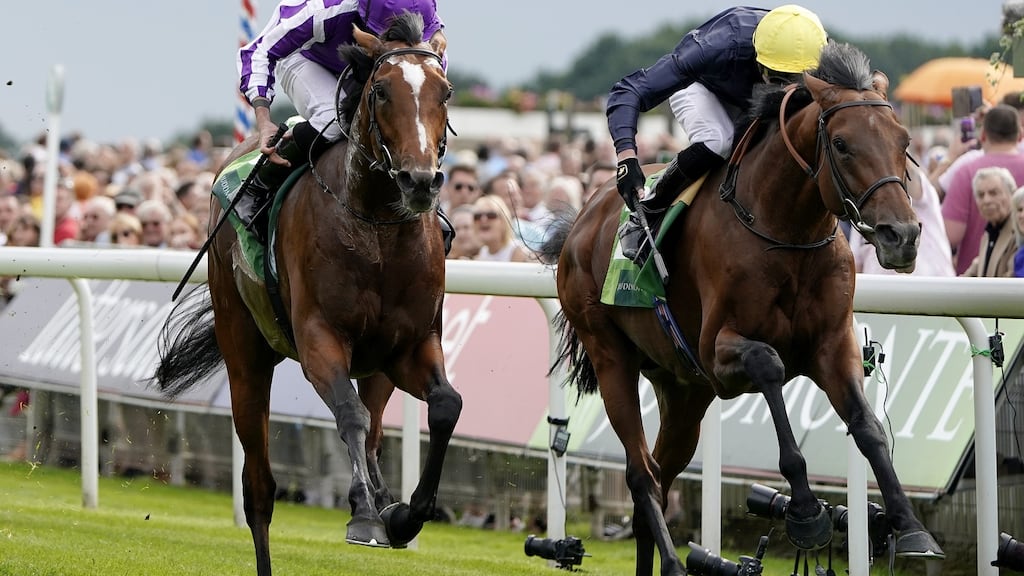 Ryan Moore and Japan, left, en route to winning the Juddmonte International Stakes at York in August: the parnetship is set to be renewed for Sunday’s Qatar Prix de l’Arc de Triomphe. Photograph: Alan Crowhurst/Getty Images