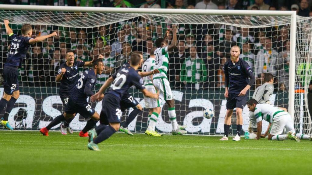 Malmo’s Jo Inge Berget (second right) scores his side’s second goal deep into injury time in the Uefa Champions League qualifying play-off first leg against Celtic at Celtic Park. Photograph: Jeff Holmes/PA