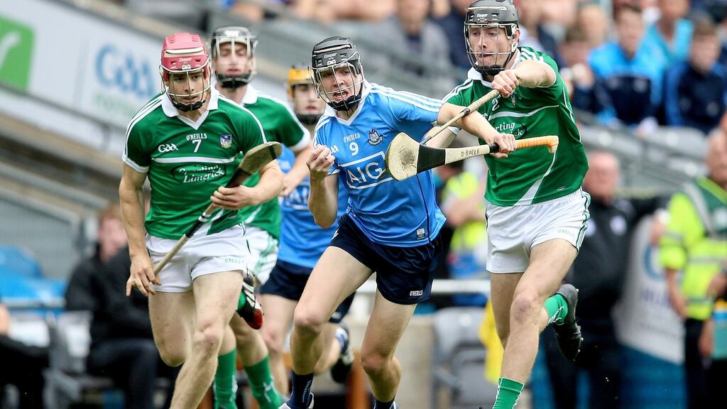 Dublin’s Conor Ryan with Finn Hourigan and Brian Nash of Limerick. Photograph: Tommy Dickson/Inpho