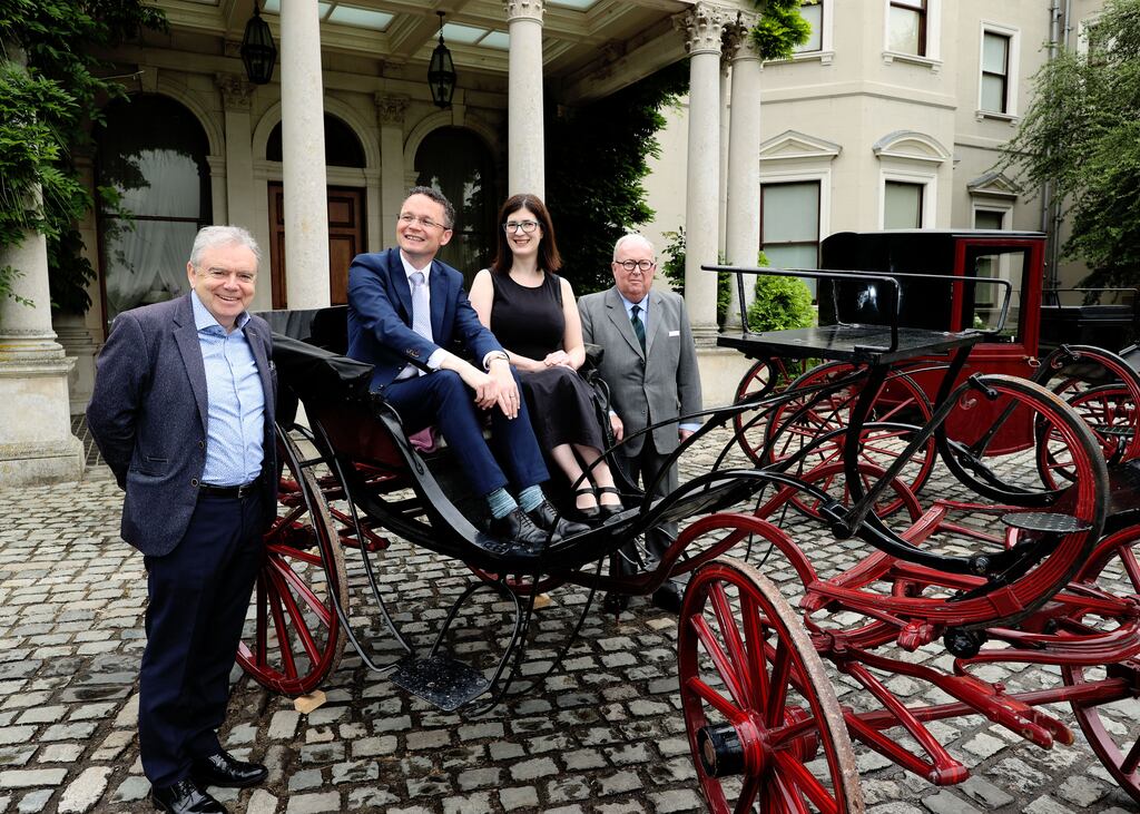 Dr Tony Boylan, a Browne Family trustee, Minister of State with responsibility for the Office of Public Works, Patrick O’Donovan, Katie Morrisroe, Principal Officer, National Historic Properties and Richard Ryan, another Browne Family trustee, at the OPW announce the loan of the Garech Browne Library and the gift of his 69 horse-drawn carriages to the State at Farmleigh. Photograph: Maxwells