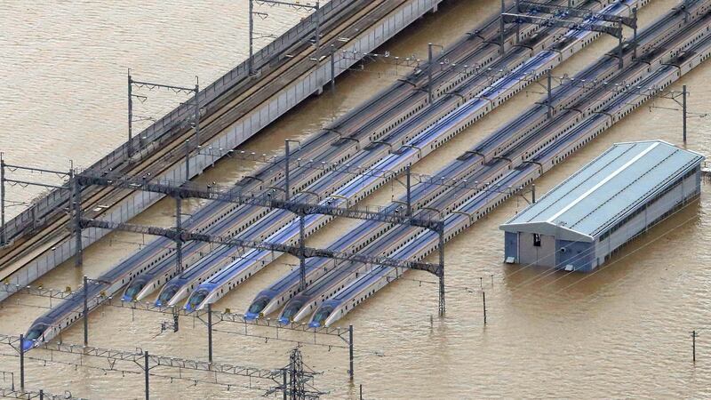 Shinkansen trains in a flooded area in Nagano on Sunday. Photograph: EPA/Jiji press