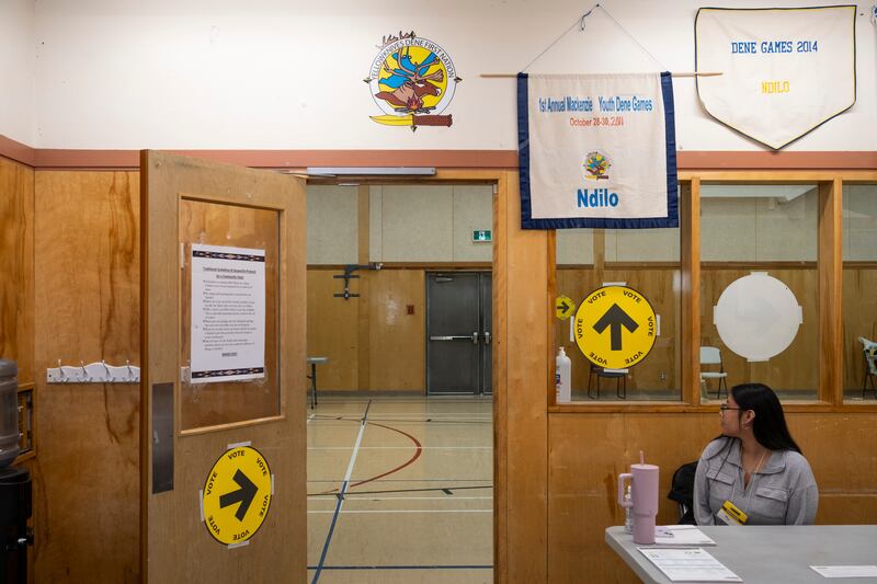 Canada: A elections worker at a polling station in Ndilo, a Yellowknives Dene First Nation community. Photograph: Pat Kane/The New York Times