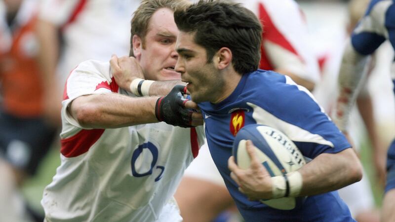 French scrumhalf Dimitri Yachvili is tackled by English fullback Joss Lewsey the 2006 Six Nations match at the Stade de France. Photograph: Gabriel Bouys/AFP via Getty Images