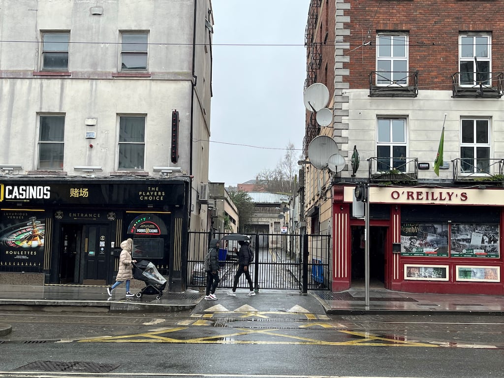 Parnell Place, a laneway off Parnell Street that a publican has closed down by erecting gates. Photograph Olivia Kelly