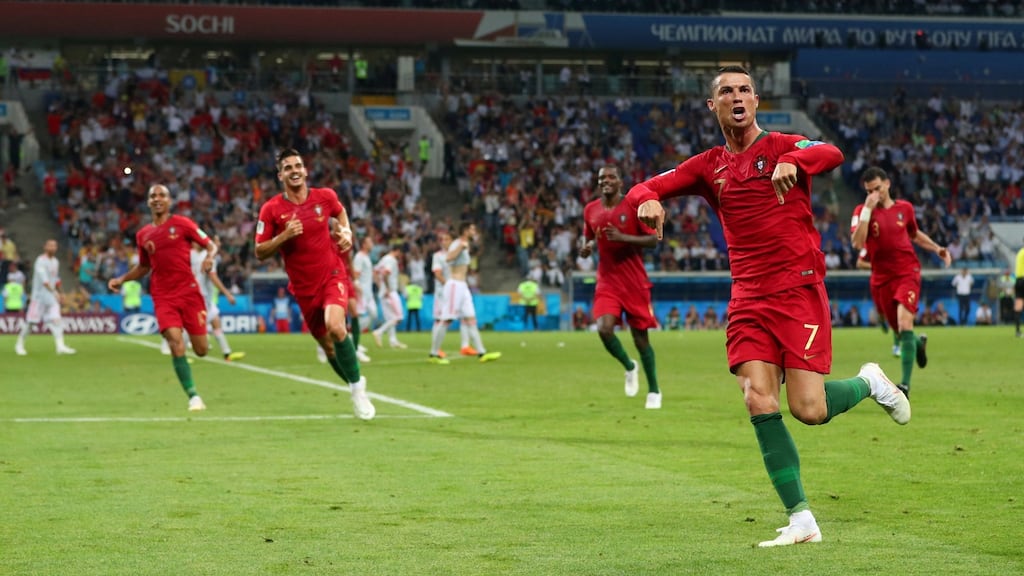 Portugal’s Cristiano Ronaldo celebrates scoring his  third goal in the World Cup Group B clash with Spain at the Fisht Stadium in Sochi. Photograph: Hannah McKay/Reuters